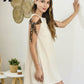 Minivestido Naomi - Beige con Lazos Print